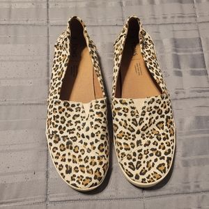 Like New Toms slip ons cheetah print, Women's size 9